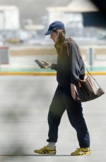 ESTE, DANIELLE and ALANA HAIM at an Airport in Los Angeles 07/07/2023