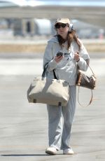 ESTE, DANIELLE and ALANA HAIM at an Airport in Los Angeles 07/07/2023