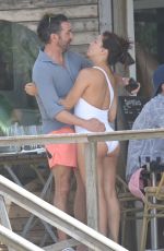 EVA LONGORIA in a White Swimsuit at a Beach in Marbella 07/21/2023