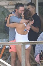 EVA LONGORIA in a White Swimsuit at a Beach in Marbella 07/21/2023
