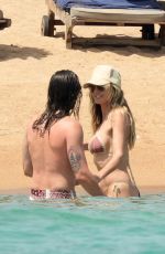 HEIDI KLUM in Bikini at a Beach in Porto Cervo 07/16/2023