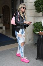 HEIDI KLUM in Ripped Denim Leaves Her Hotel in Paris 07/05/2023