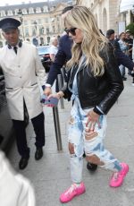 HEIDI KLUM in Ripped Denim Leaves Her Hotel in Paris 07/05/2023