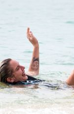 HELEN FLANAGAN on the Beach with Friends in Barbados 07/29/2023