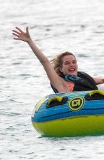 HELEN FLANAGAN on the Beach with Friends in Barbados 07/29/2023