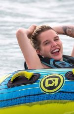 HELEN FLANAGAN on the Beach with Friends in Barbados 07/29/2023