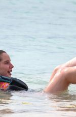 HELEN FLANAGAN on the Beach with Friends in Barbados 07/29/2023