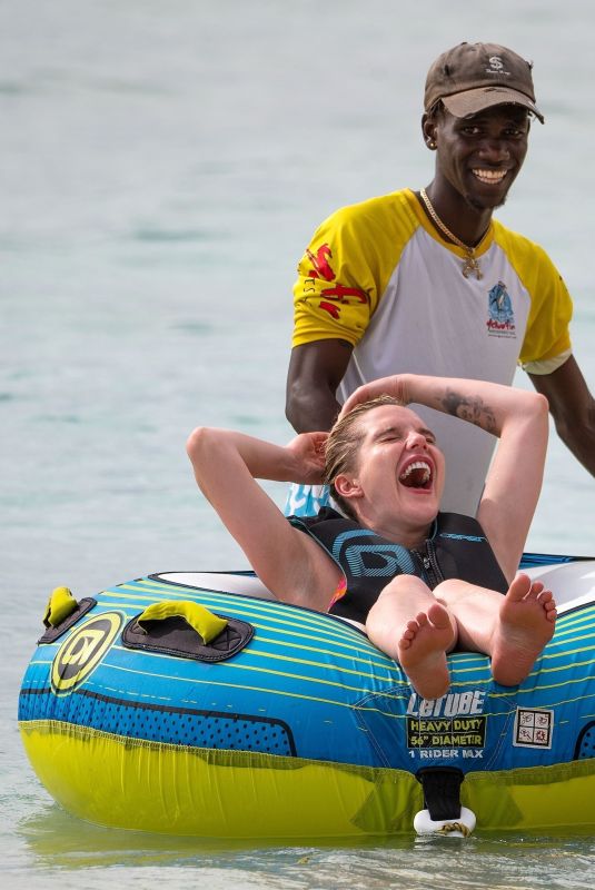 HELEN FLANAGAN on the Beach with Friends in Barbados 07/29/2023