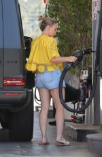 HILARY DUFF in a Denim Skirt at a Gas Station in Los Angeles 07/07/2023