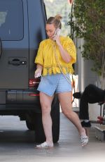 HILARY DUFF in a Denim Skirt at a Gas Station in Los Angeles 07/07/2023