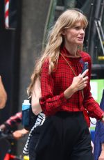 JULIA STEGNER at a Photoshoot for Carolina Herrera on Fifth Avenue in New York 07/17/2023