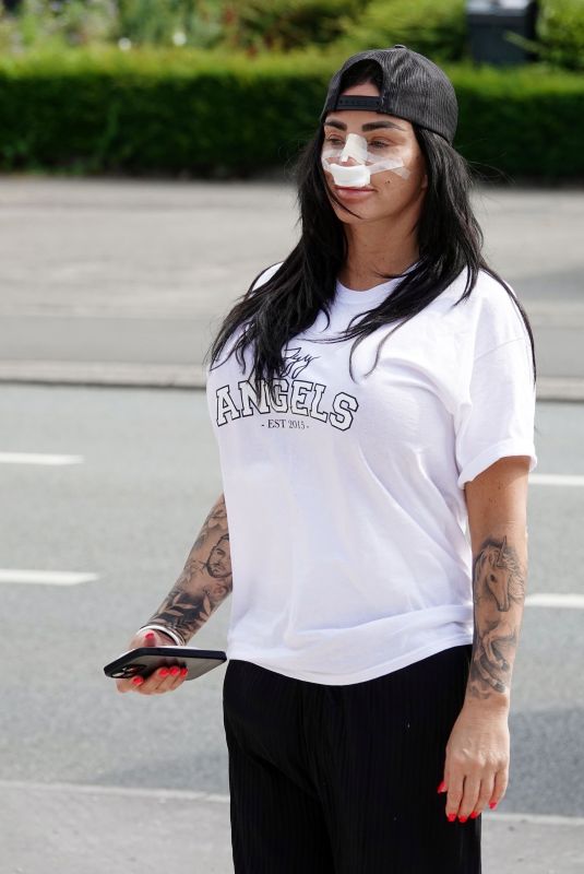 KATIE PRICE Heavily Bandaged Up After Nose, Lifted Lips and Abdominal Etching Surgery at BeClinic in Belgium 07/09/2023