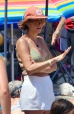 KRISTEN WIIG in Bikini at a Beach in Los Angeles 07/16/2023