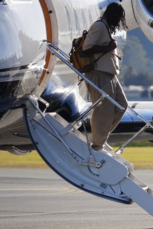 LIZZO Arrives on Gold Coast with Her Boyfriend on a Private Jet 07/19/2023