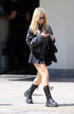 LOTTIE MOSS Out Reading The Unexpected Joy of Being Sober by Catherine Gray in London 07/17/2023