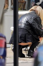 LOTTIE MOSS Out Reading The Unexpected Joy of Being Sober by Catherine Gray in London 07/17/2023