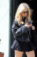 LOTTIE MOSS Out Reading The Unexpected Joy of Being Sober by Catherine Gray in London 07/17/2023