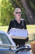 MELANIE GRIFFITH Arrives at a Friend