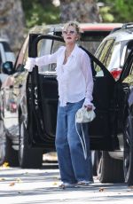 MELANIE GRIFFITH Out Visiting a Friend in Beverly Hills 07/17/2023