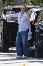 MELANIE GRIFFITH Out Visiting a Friend in Beverly Hills 07/17/2023
