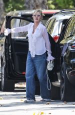 MELANIE GRIFFITH Out Visiting a Friend in Beverly Hills 07/17/2023