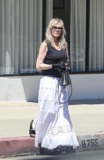 MELANIE GRIFFITH Shows off Her New Tattoo Out in Los Angeles 07/10/2023