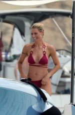 MICHELLE HUNZIKER and AURORA RAMAZZOTTI in Biknis at a Boat at La Maddalena 07/23/2023