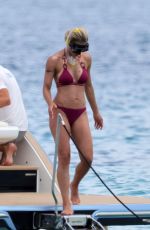 MICHELLE HUNZIKER and AURORA RAMAZZOTTI in Biknis at a Boat at La Maddalena 07/23/2023
