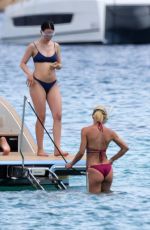 MICHELLE HUNZIKER and AURORA RAMAZZOTTI in Biknis at a Boat at La Maddalena 07/23/2023