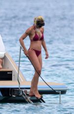 MICHELLE HUNZIKER and AURORA RAMAZZOTTI in Biknis at a Boat at La Maddalena 07/23/2023
