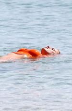 MICHELLE HUNZIKER at a Beach in Porto Cervo 07/20/2023