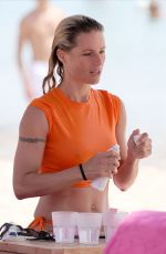 MICHELLE HUNZIKER at a Beach in Porto Cervo 07/20/2023