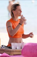MICHELLE HUNZIKER at a Beach in Porto Cervo 07/20/2023