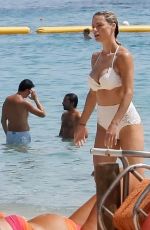 MICHELLE HUNZIKER in a White Bikini at a Beach in Sardinia 07/24/2023