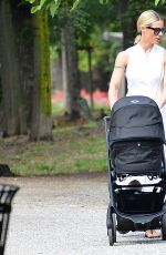 MICHELLE HUNZIKER Out with Her Grandson at a Park in Milan 07/04/2023