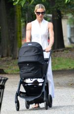 MICHELLE HUNZIKER Out with Her Grandson at a Park in Milan 07/04/2023
