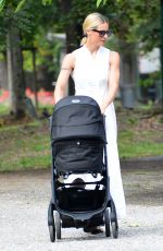 MICHELLE HUNZIKER Out with Her Grandson at a Park in Milan 07/04/2023