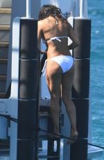 MICHELLE RODRIGUEZ in a White Bikini at a Boat in Italy 07/25/2023