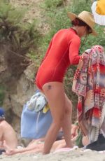 MINNIE DRIVER in Wetsuit at a Beach in Malibu 07/24/2023