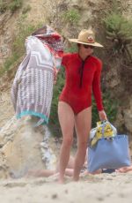 MINNIE DRIVER in Wetsuit at a Beach in Malibu 07/24/2023