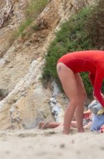 MINNIE DRIVER in Wetsuit at a Beach in Malibu 07/24/2023