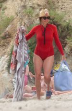 MINNIE DRIVER in Wetsuit at a Beach in Malibu 07/24/2023