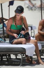 NINA AGDAL in Bikini at a Beach in Miami 07/21/2023