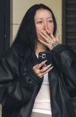 NOAH CYRUS Smokes Outside Her Hotel in Sydney 07/19/2023