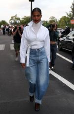 TINA KUNAKEY Leaves Azzedine Alaia Haute Couture Show in Paris 07/02/2023