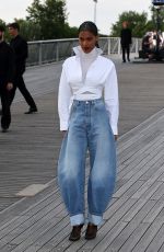 TINA KUNAKEY Leaves Azzedine Alaia Haute Couture Show in Paris 07/02/2023