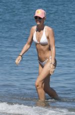 VOGUE WILLIAMS in a White Bikini at a Beach in Sotogrande 07/25/2023