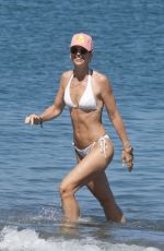 VOGUE WILLIAMS in a White Bikini at a Beach in Sotogrande 07/25/2023