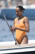 ZOE SALDANA in Swimsuit at a Yacht in Sardinia 07/23/2023