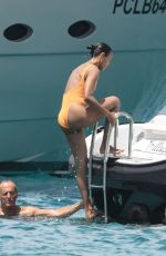 ZOE SALDANA in Swimsuit at a Yacht in Sardinia 07/23/2023